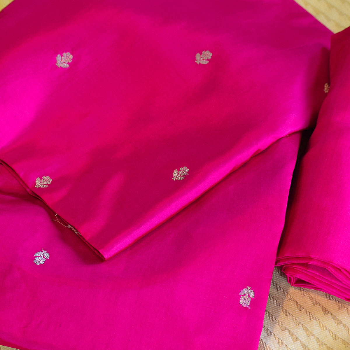 Rani Pink Handwoven Banarasi Munga Muslin Suit Set with Intricate Zari Borders & Playful Tassels