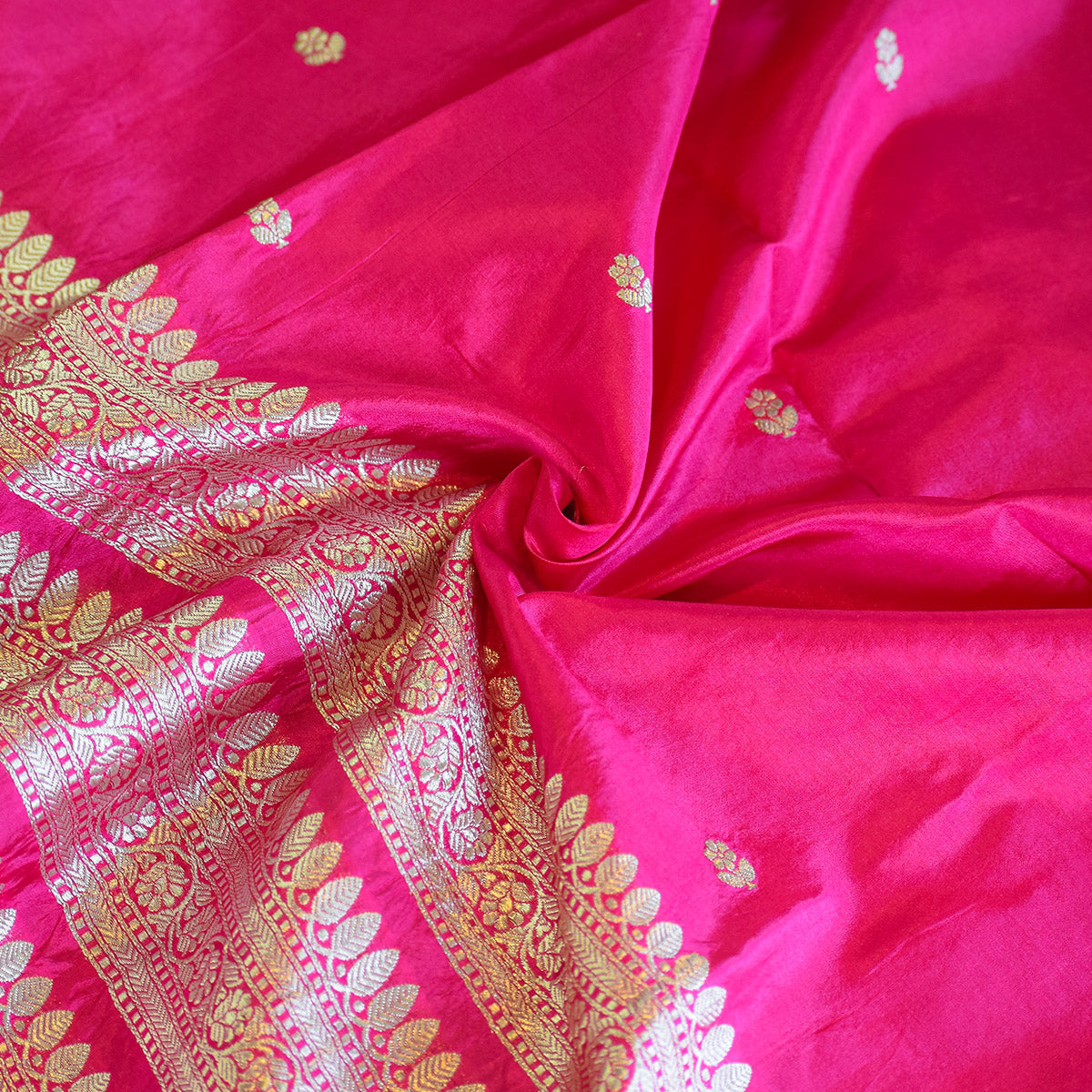 Rani Pink Handwoven Banarasi Munga Muslin Suit Set with Intricate Zari Borders & Playful Tassels