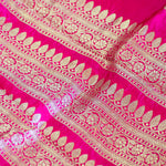 Rani Pink Handwoven Banarasi Munga Muslin Suit Set with Intricate Zari Borders & Playful Tassels