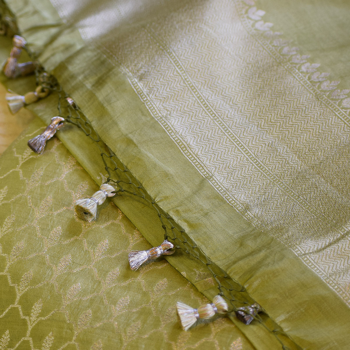 Olive Green Handwoven Banarasi Munga Muslin Suit Set with Zari Butis & Ornate Border