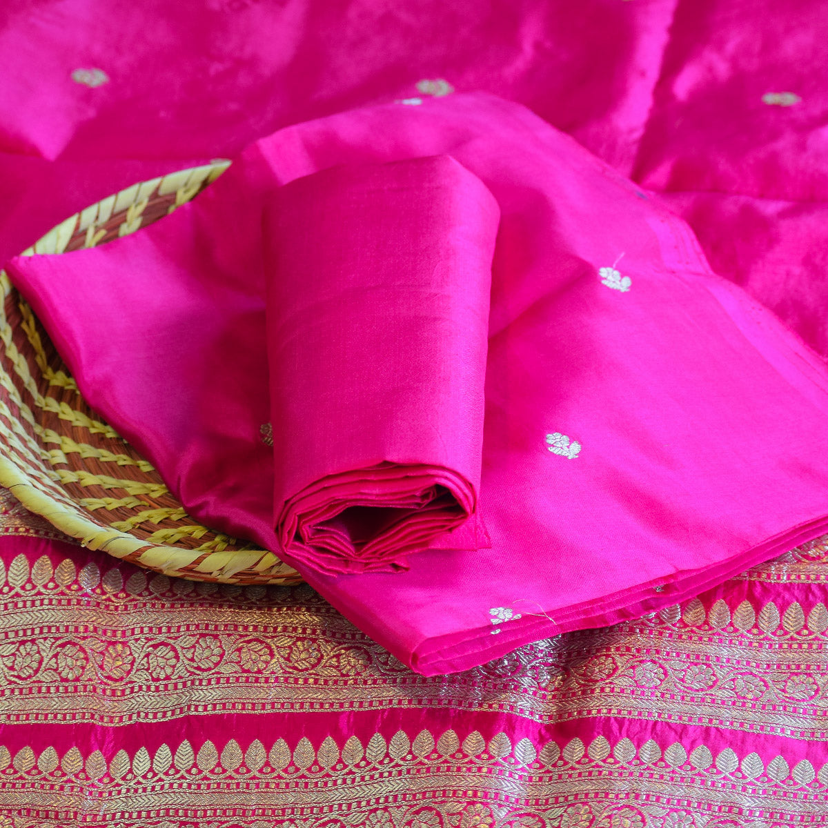 Rani Pink Handwoven Banarasi Munga Muslin Suit Set with Intricate Zari Borders & Playful Tassels