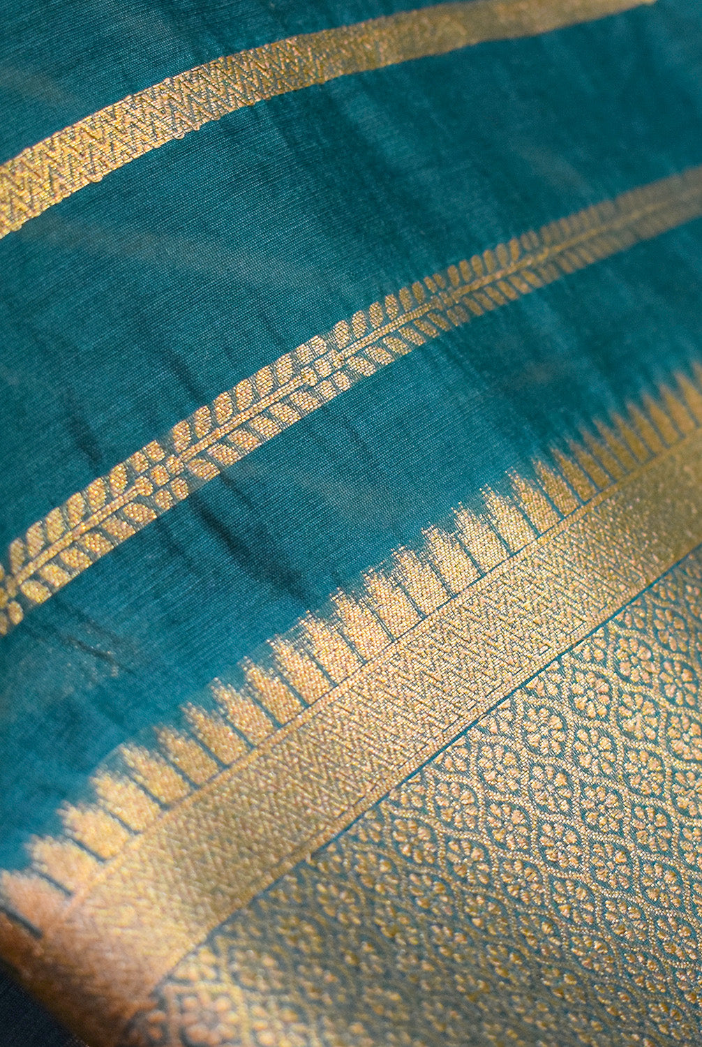 Chanderi stripes pattern woven Banarasi saree with golden border-bottle green