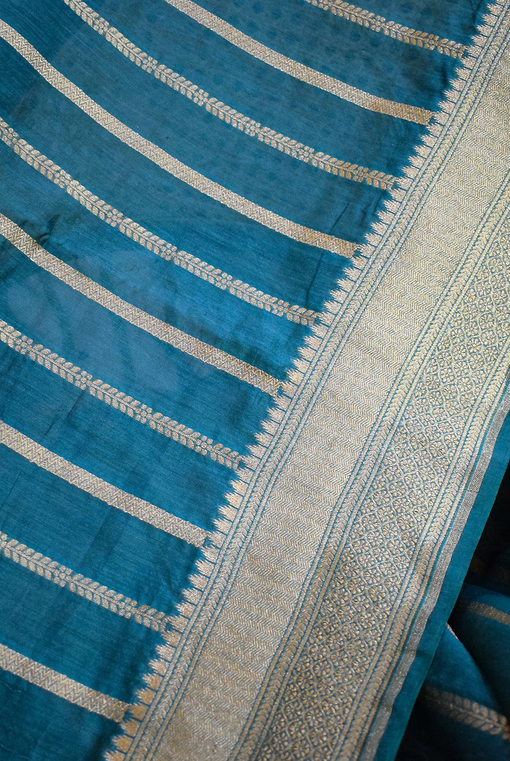 Chanderi stripes pattern woven Banarasi saree with golden border-bottle green