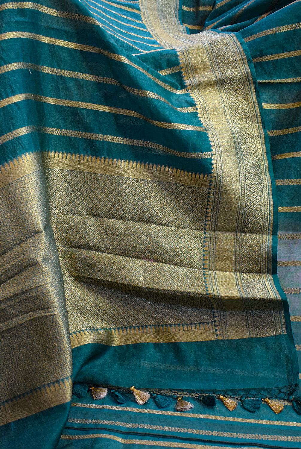 Chanderi stripes pattern woven Banarasi saree with golden border-bottle green