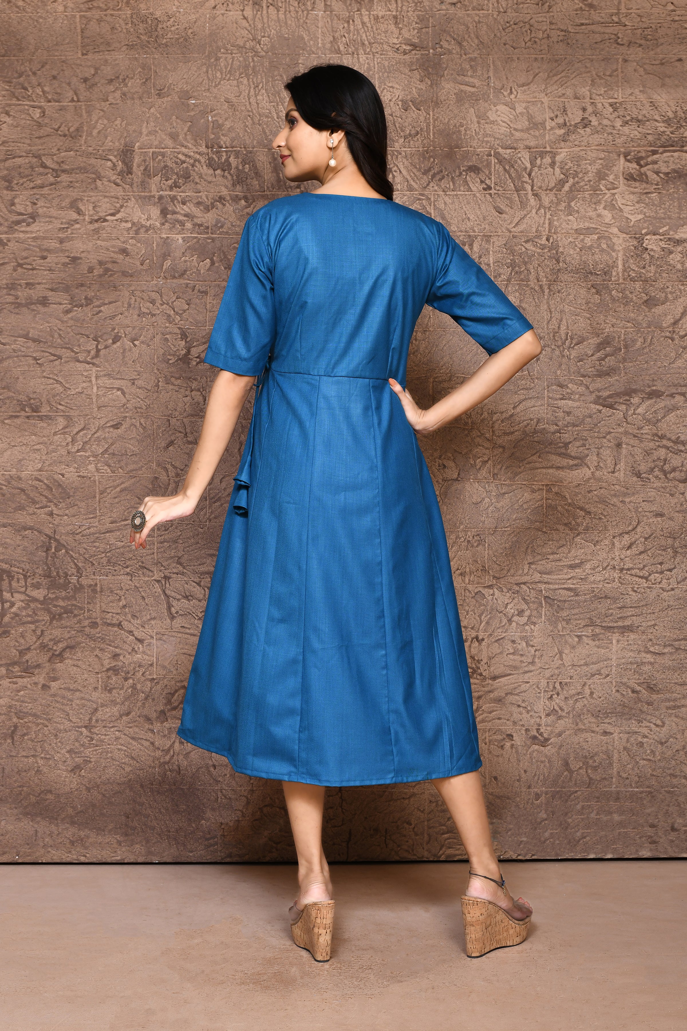 Solid color cotton slub angrakha pattern one piece with V neck and attached strings.