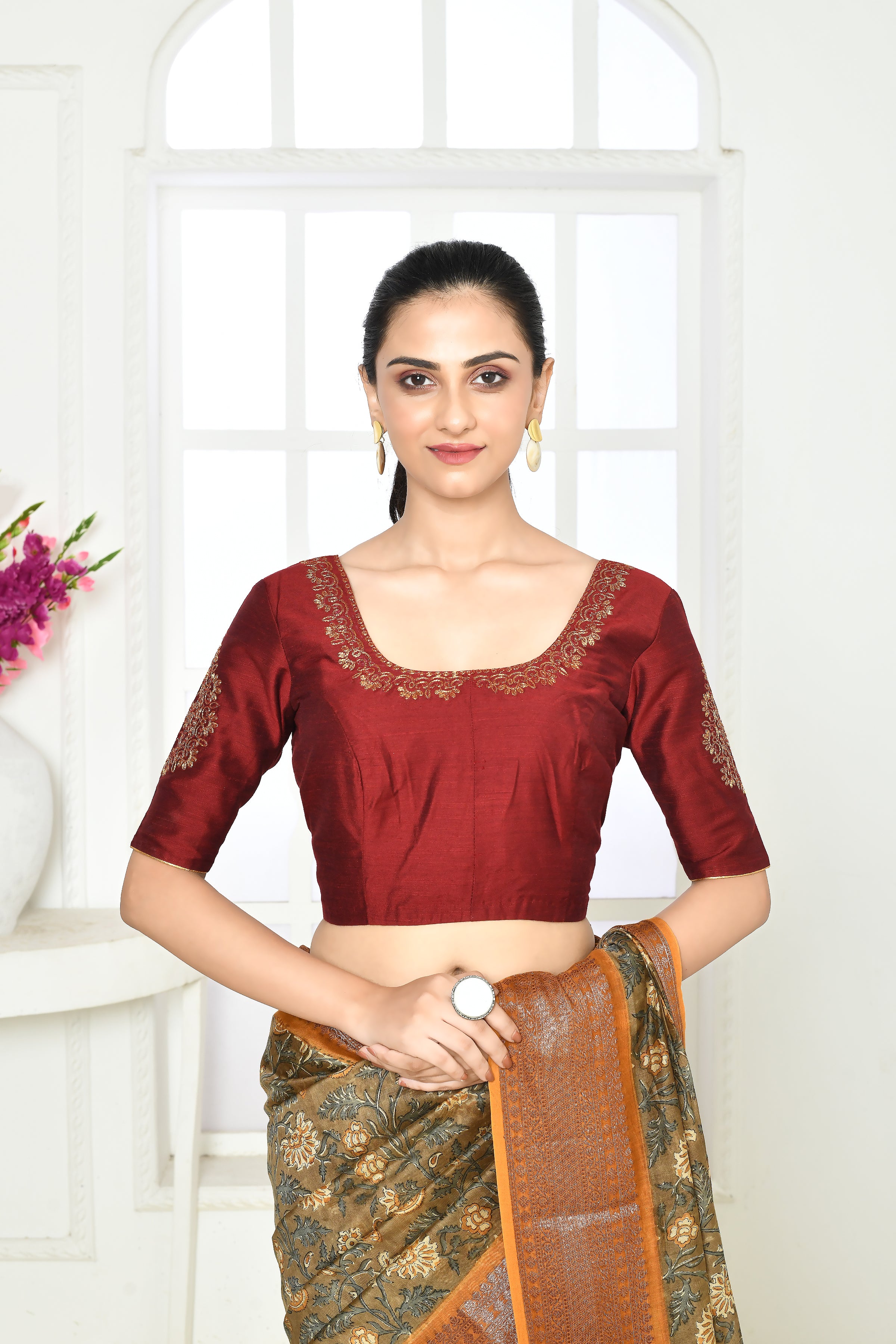 Dark maroon pure raw silk elbow length blouse with golden floral embroidery in sleeves, front and back neck.