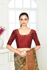 Dark maroon pure raw silk elbow length blouse with golden floral embroidery in sleeves, front and back neck.