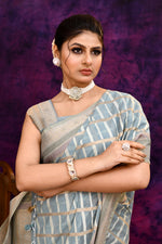 Cotton saree with golden zari banarasi border and motifs Checkered pattern-powder blue