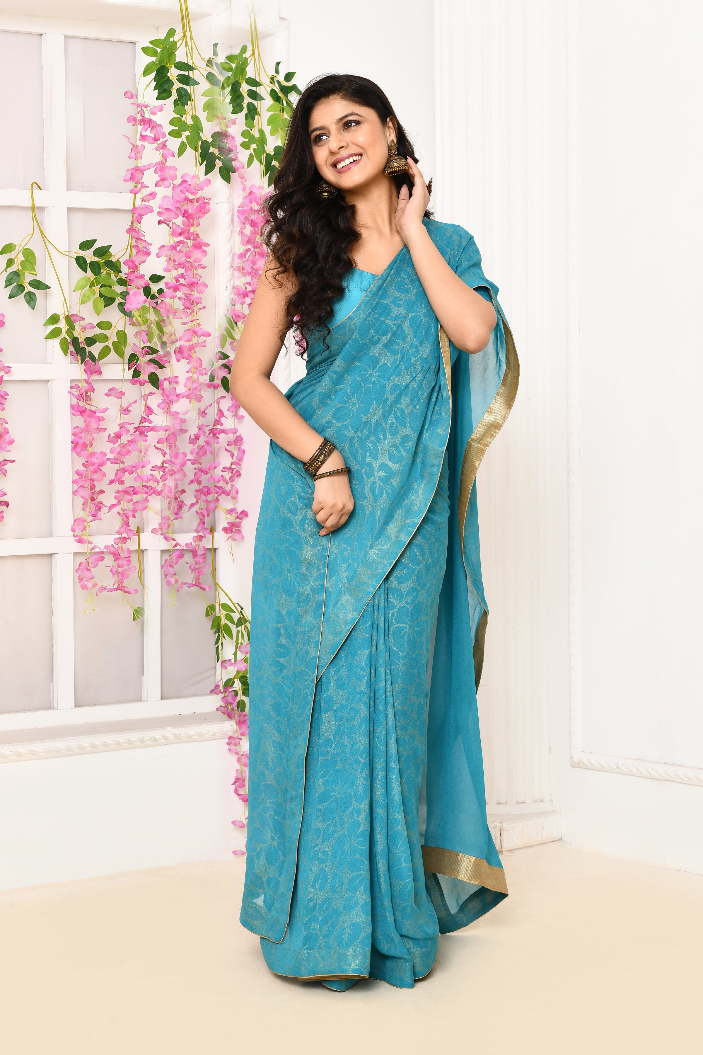 Chiffon shimmer saree with golden self print- Coppersulphate blue