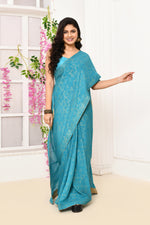 Chiffon shimmer saree with golden self print- Coppersulphate blue