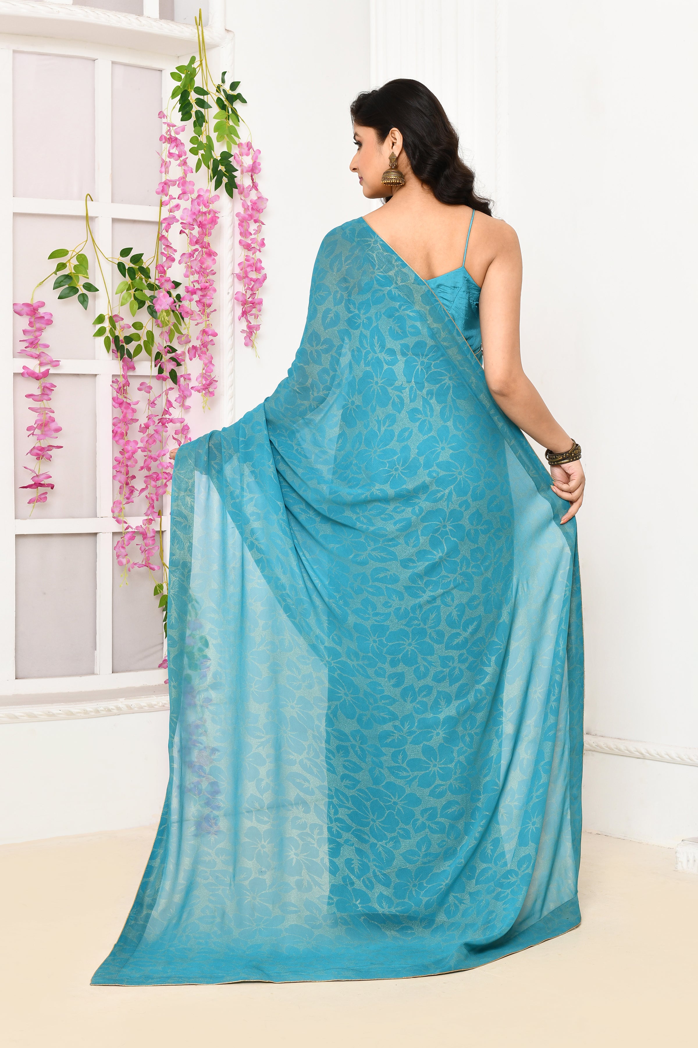 Chiffon shimmer saree with golden self print- Coppersulphate blue