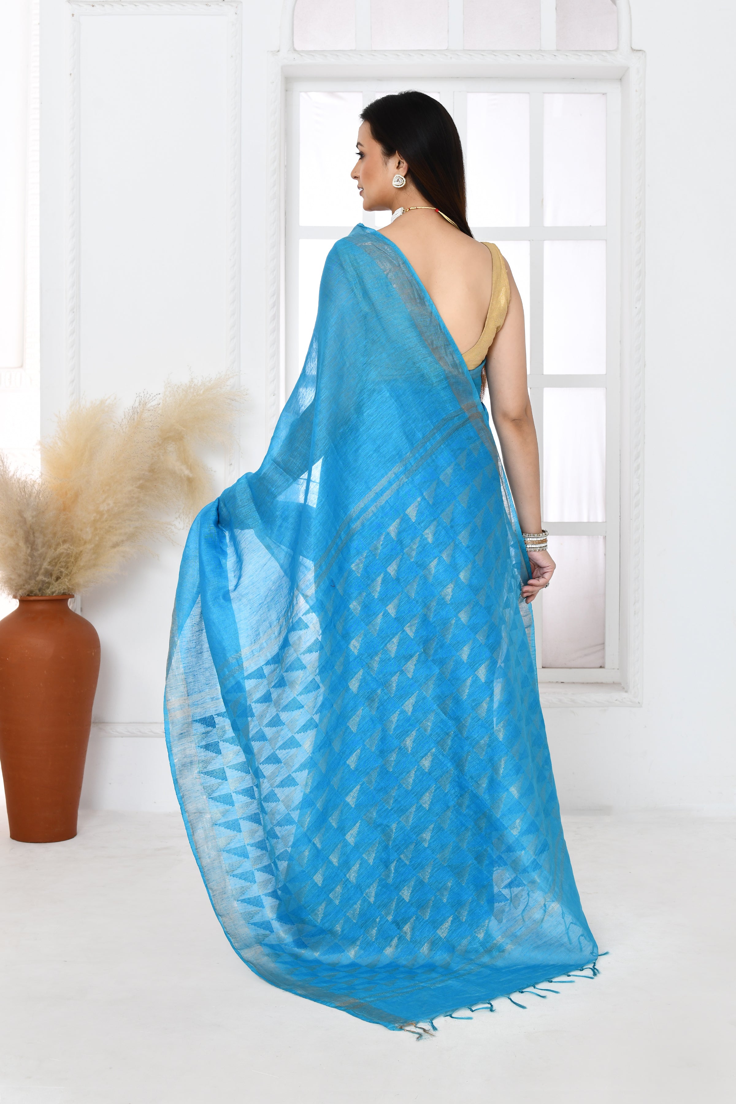 Pure handloom tussar linen saree with woven zari pallu