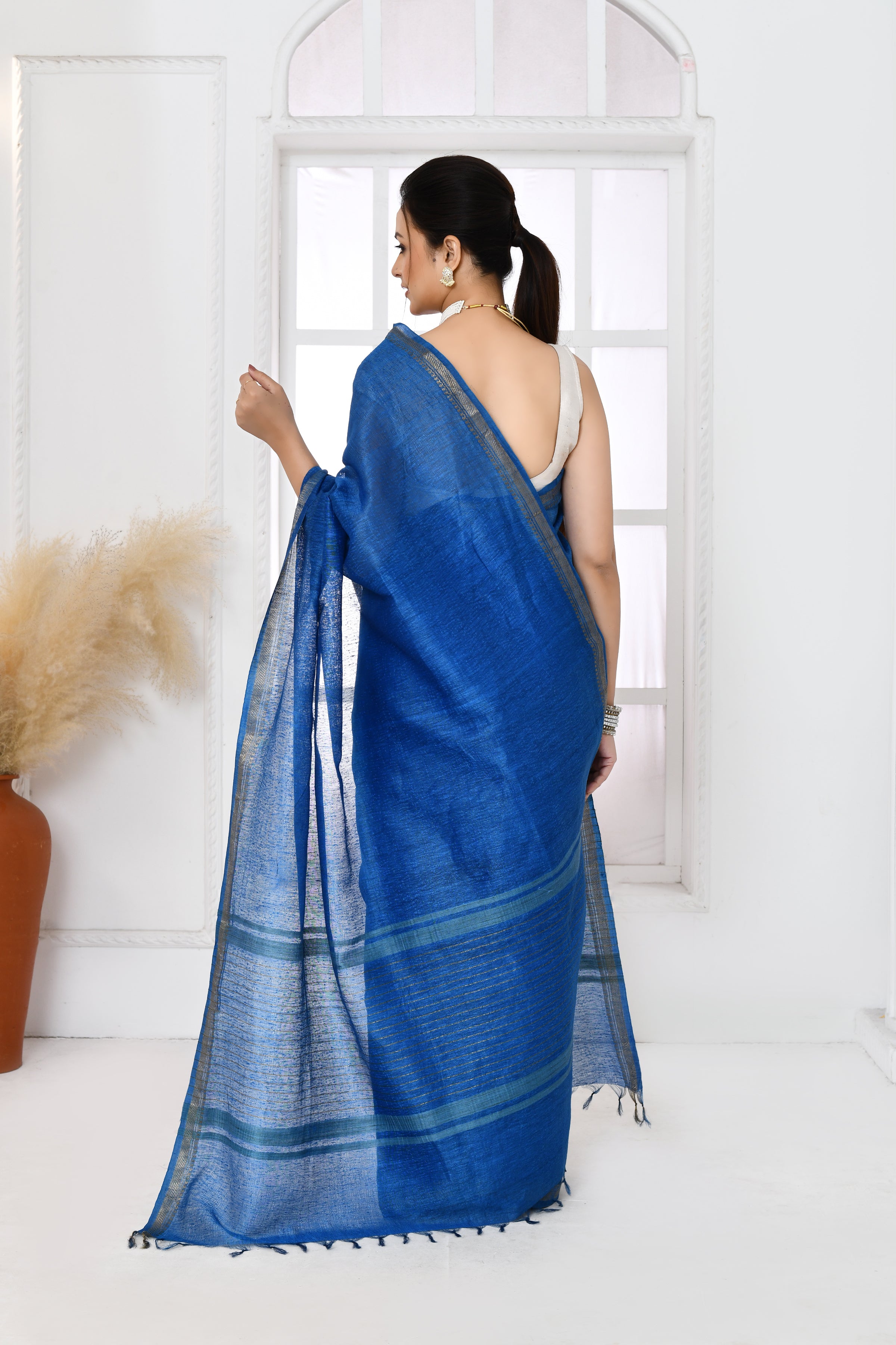 Pure tussar linen handloom saree with floral embroidered blouse