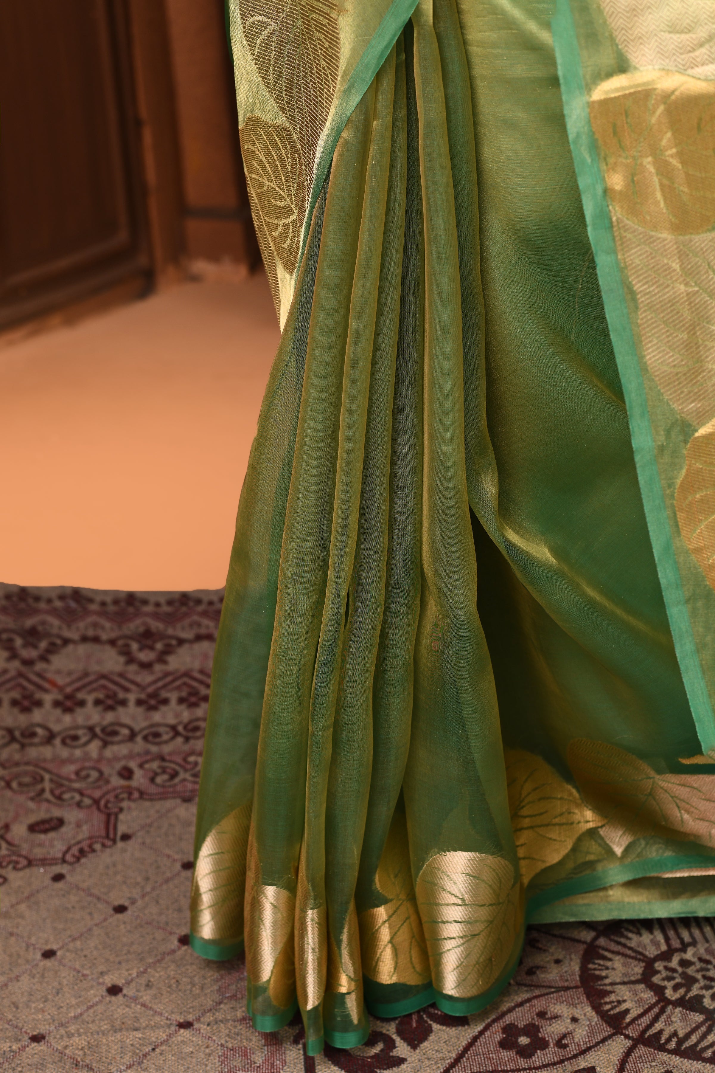 Banarasi tissue silk saree with leaf pattern woven border-Emerald green