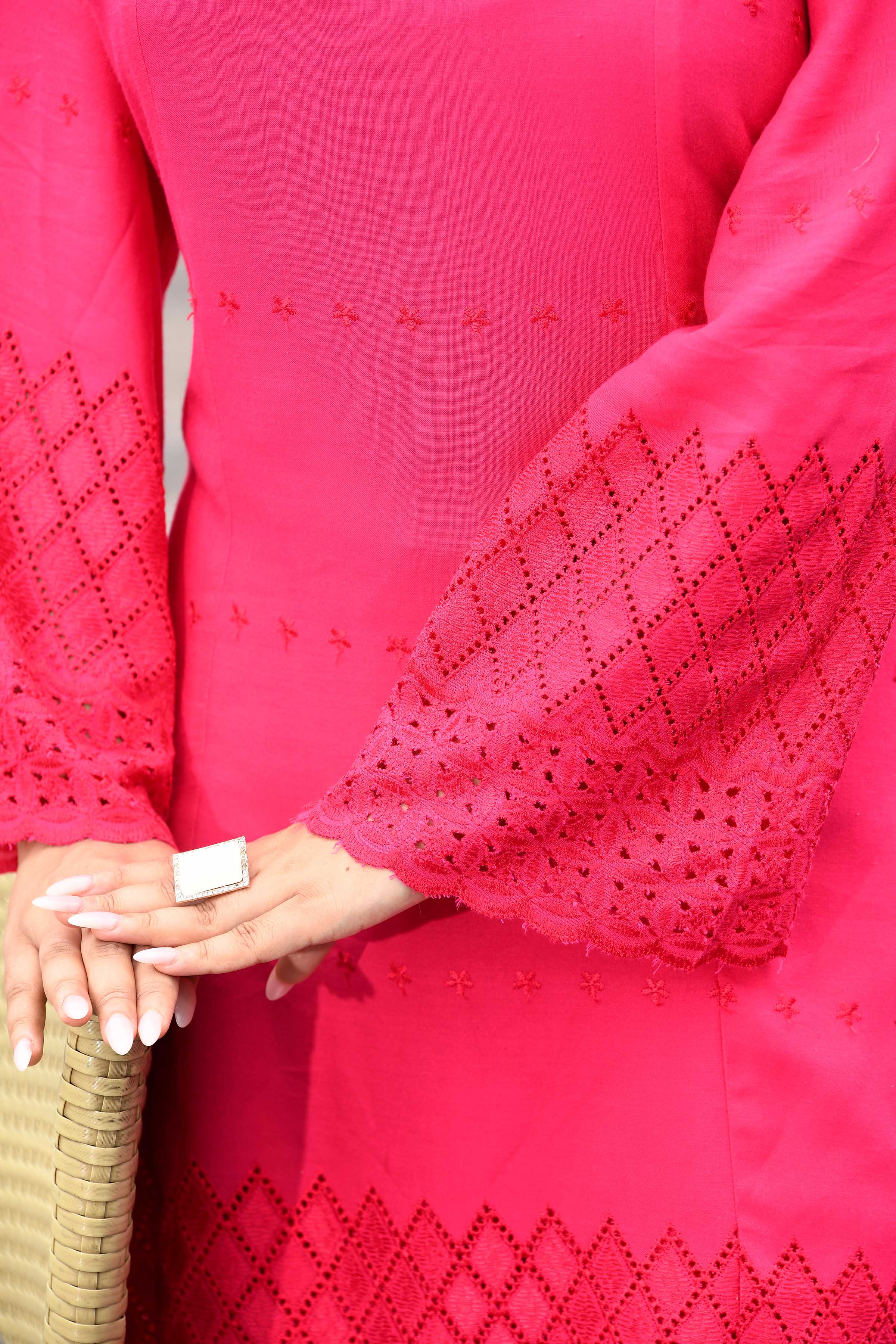 Vibrant fuschia pink flared sleeves mid thigh length straight kurta and farshi salwar set with cut work embroidery