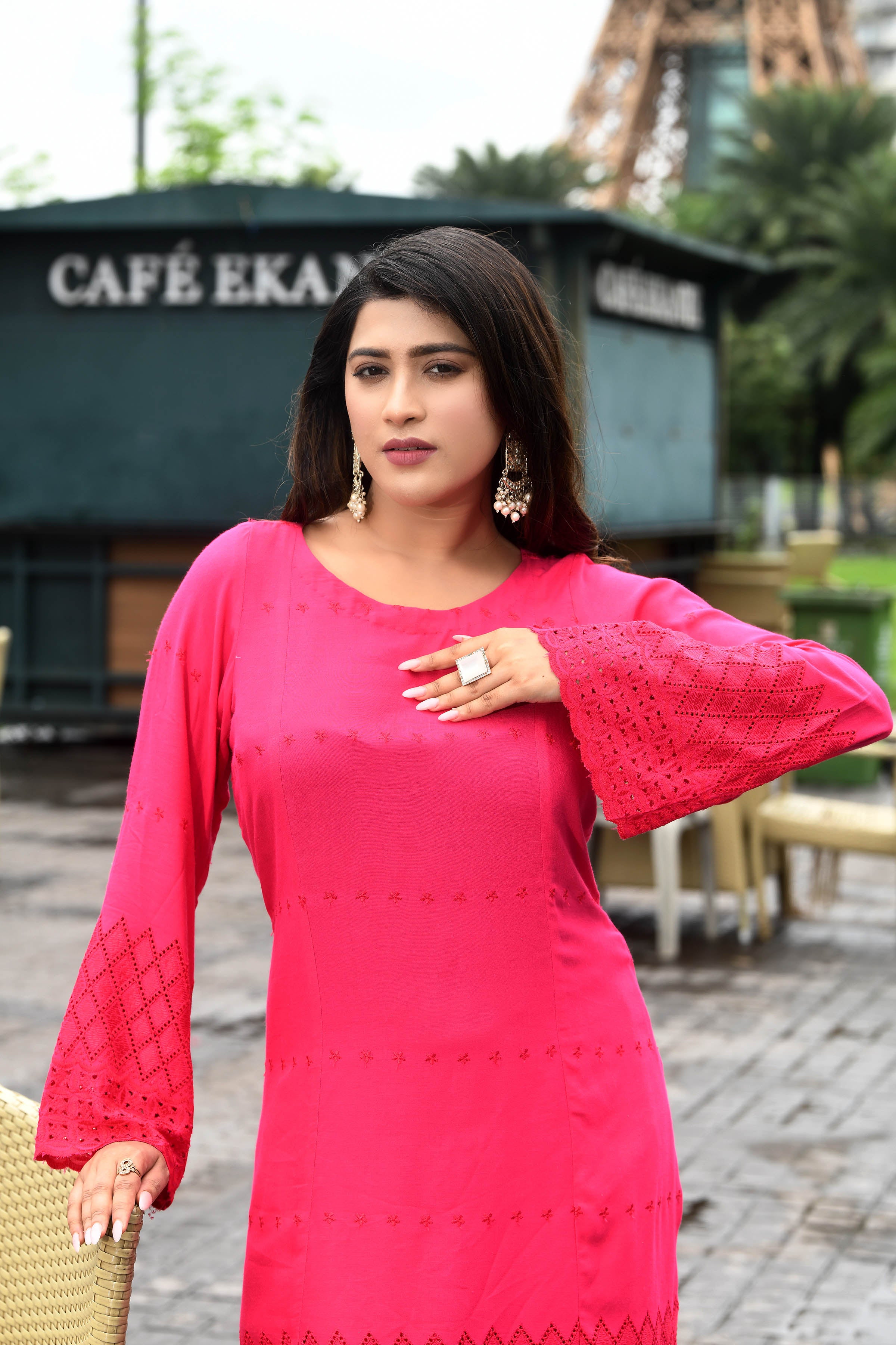 Vibrant fuschia pink flared sleeves mid thigh length straight kurta and farshi salwar set with cut work embroidery