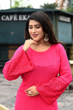 Vibrant fuschia pink flared sleeves mid thigh length straight kurta and farshi salwar set with cut work embroidery
