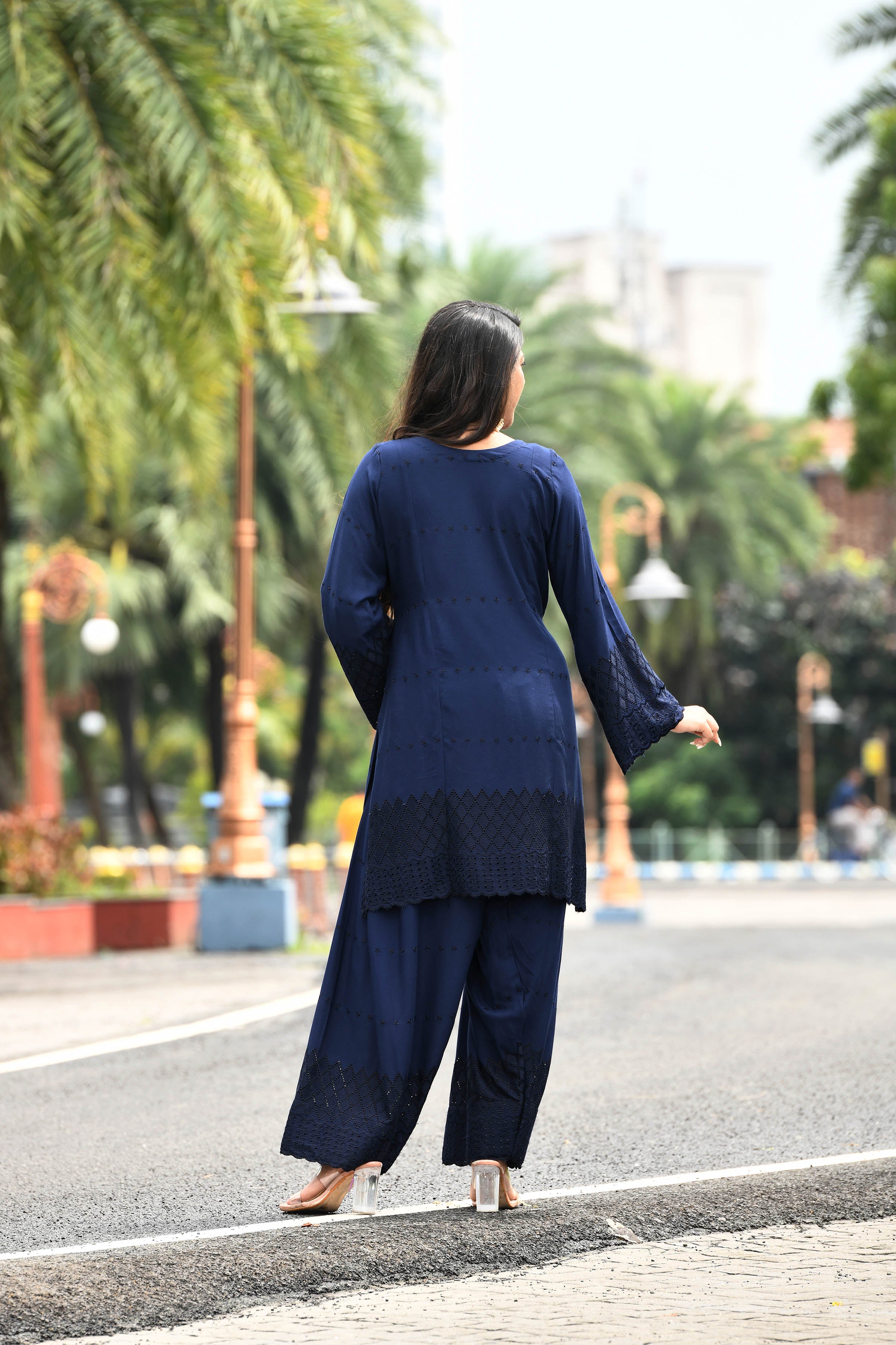 Rich Indigo blue flared sleeves mid thigh length straight kurta and farshi salwar set with cut work embroidery