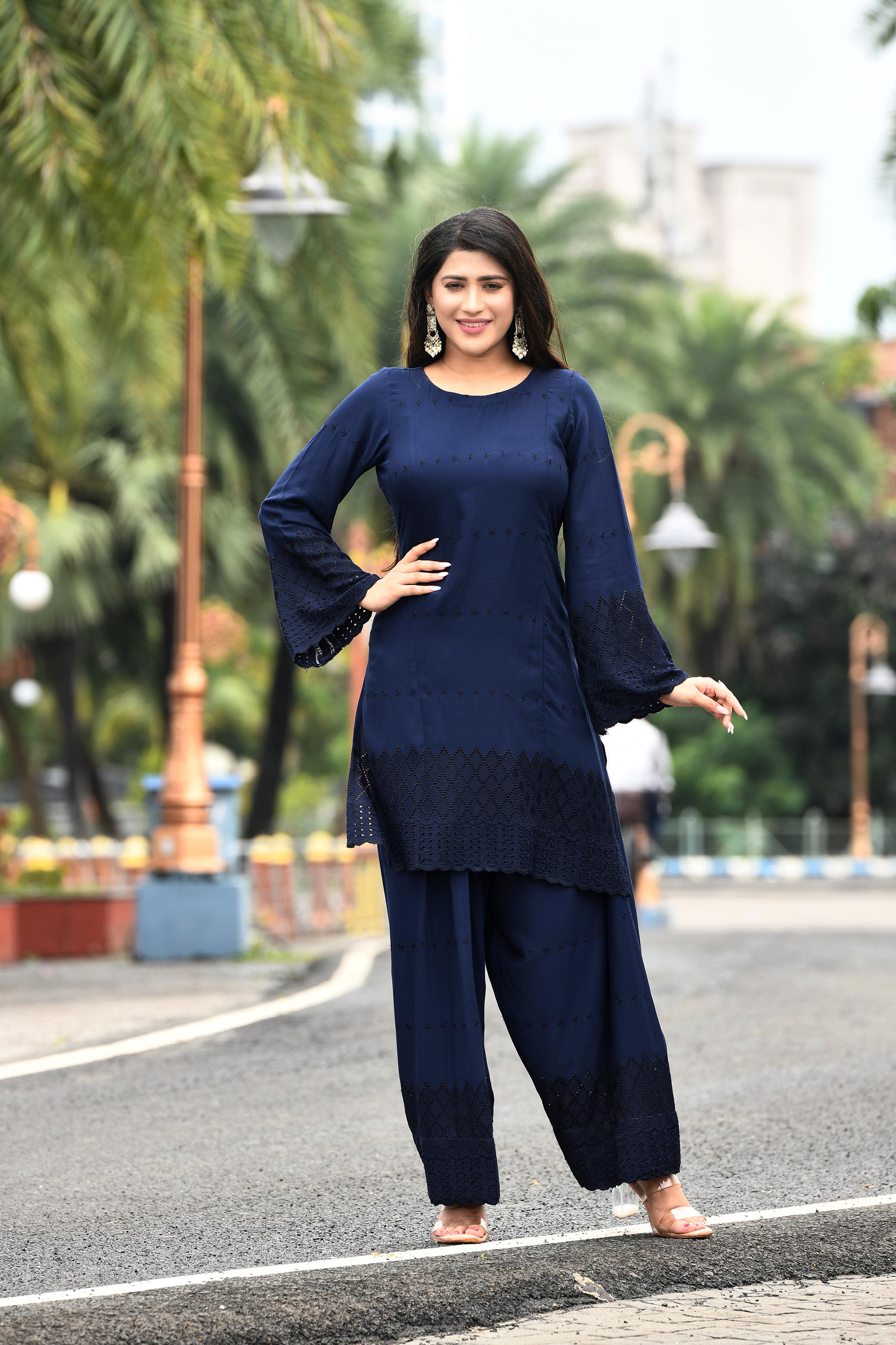 Rich Indigo blue flared sleeves mid thigh length straight kurta and farshi salwar set with cut work embroidery