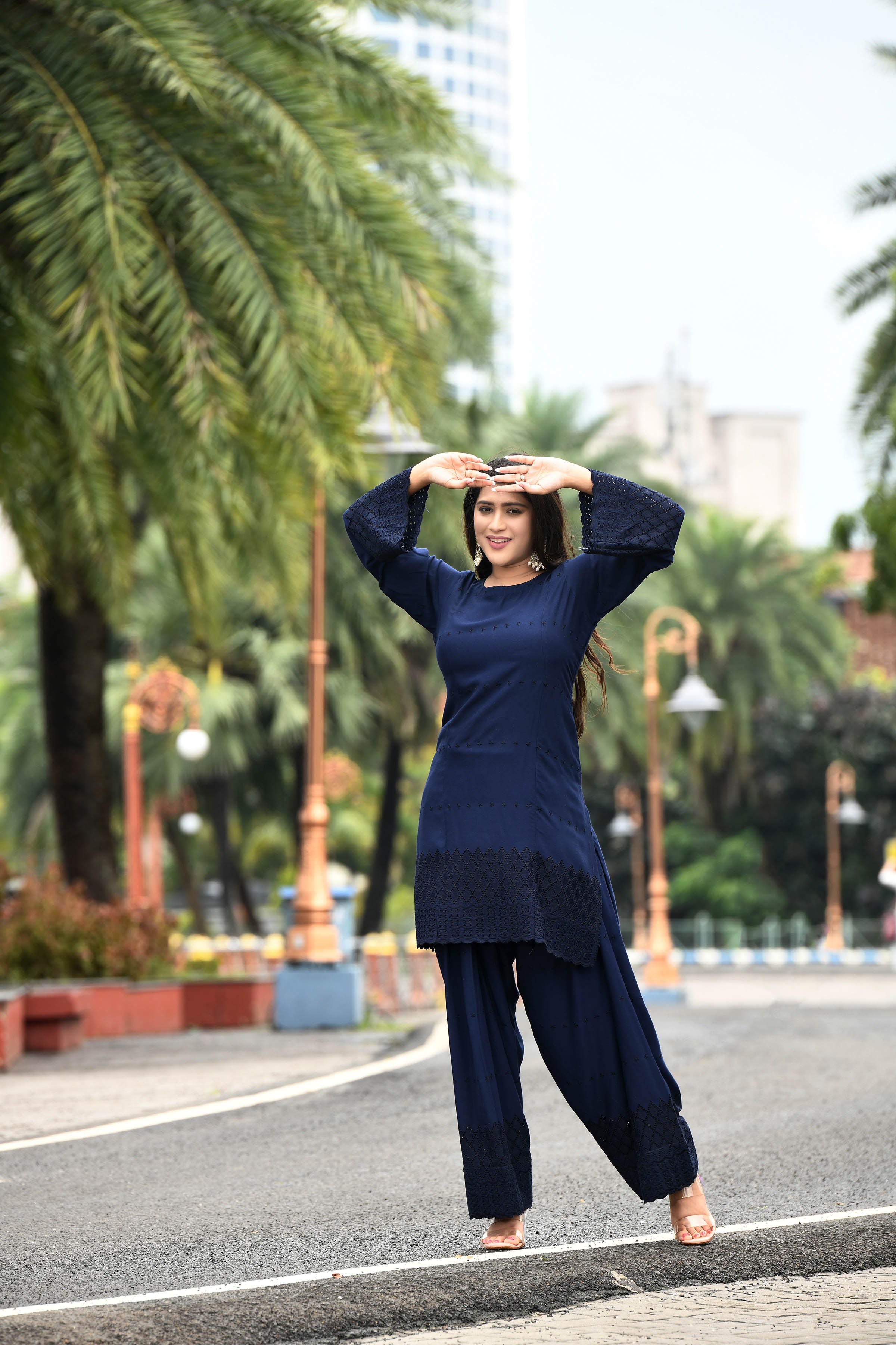 Rich Indigo blue flared sleeves mid thigh length straight kurta and farshi salwar set with cut work embroidery
