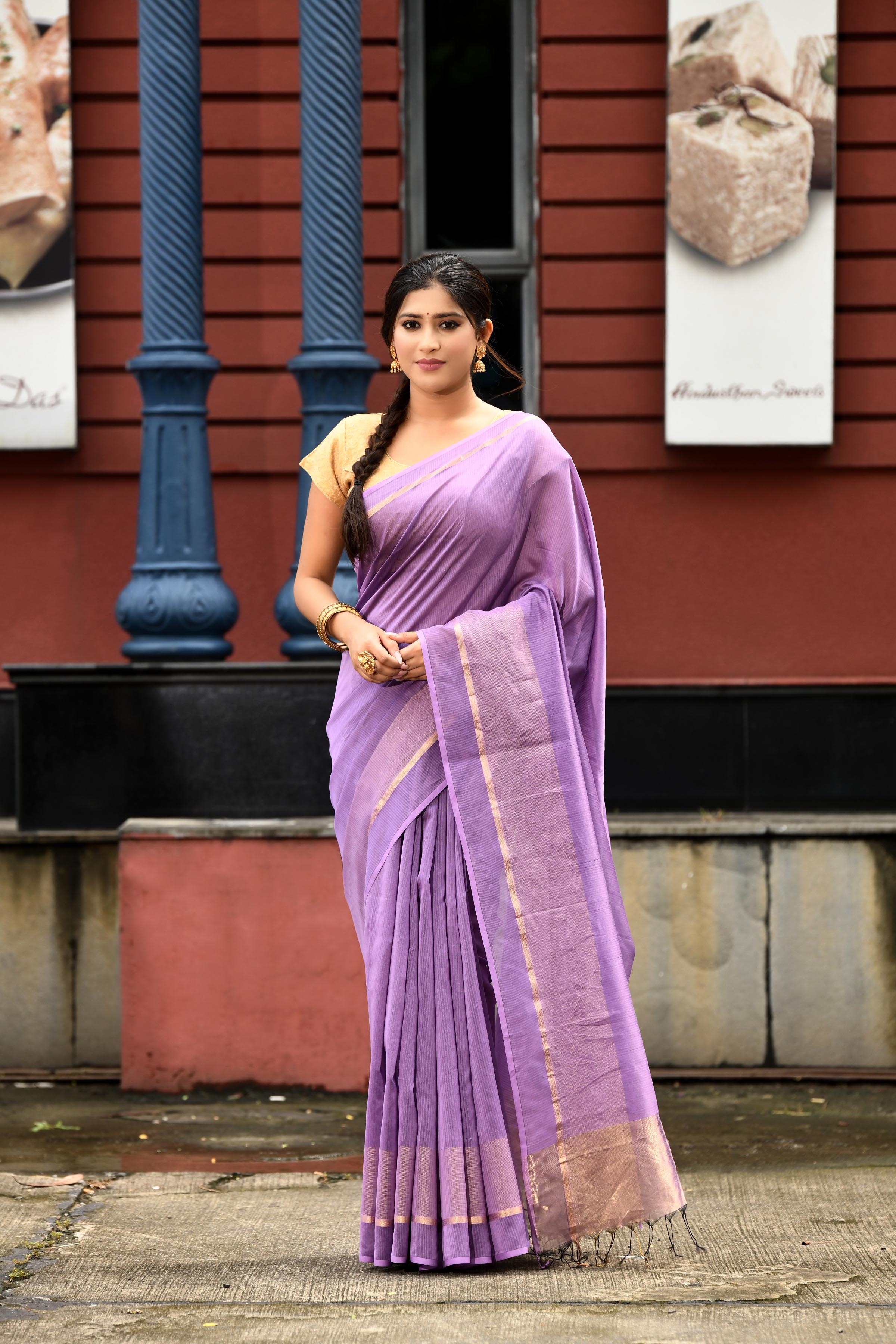 Lavender cotton silk handwoven saree with self stripes and gold pallu
