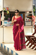 Magenta cotton silk hand woven saree with dark pink and golden border