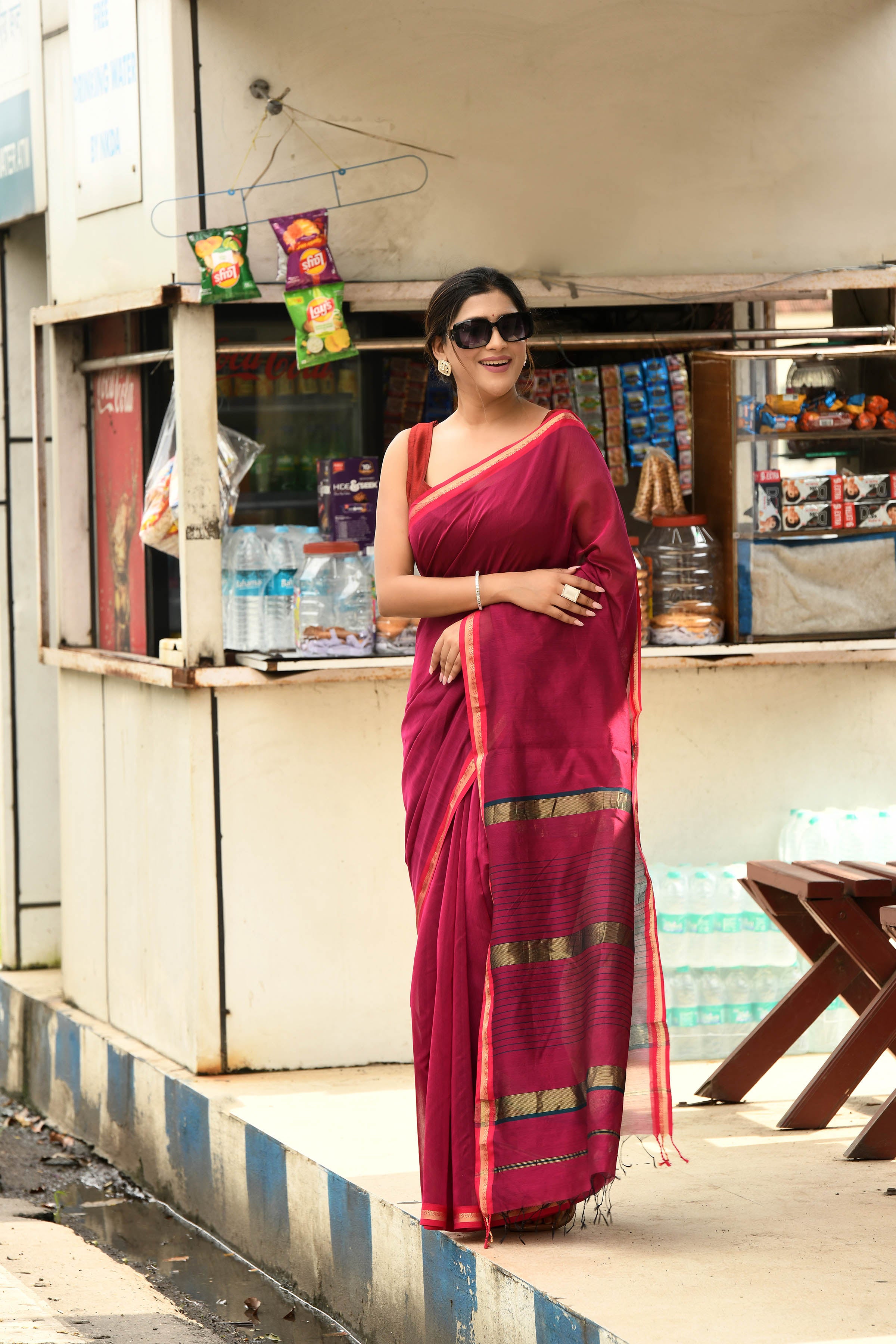 Magenta cotton silk hand woven saree with dark pink and golden border