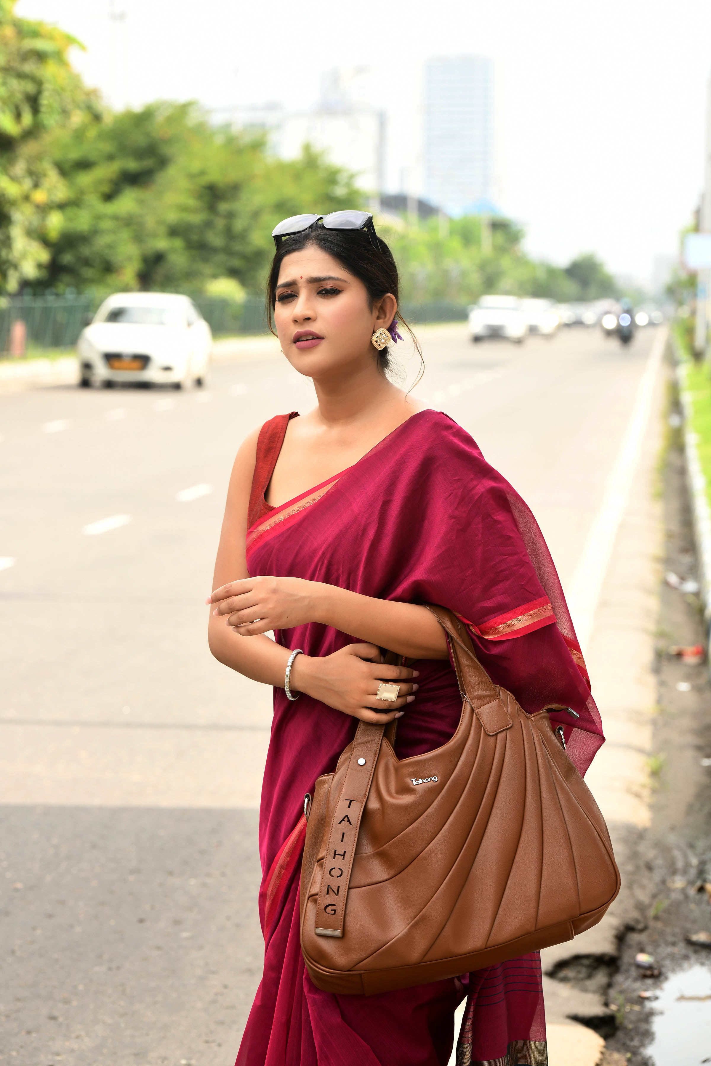 Magenta cotton silk hand woven saree with dark pink and golden border