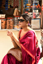 Magenta cotton silk hand woven saree with dark pink and golden border