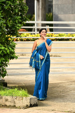 Cobalt Blue cotton silk hand woven saree with teal blue and golden border
