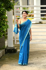 Cobalt Blue cotton silk hand woven saree with teal blue and golden border