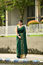 Bottle green cotton silk handwoven saree with self stripes and gold pallu