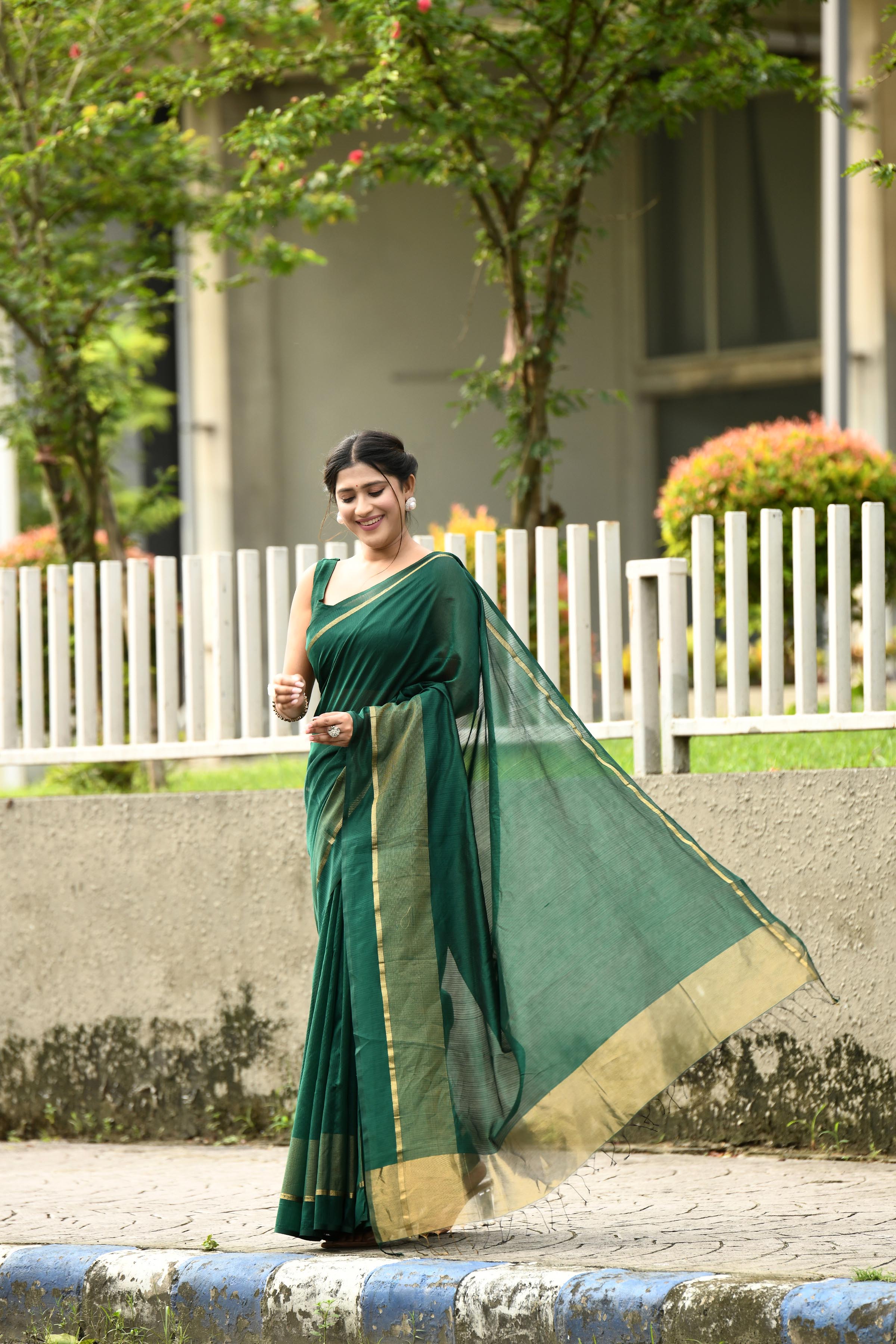 Bottle green cotton silk handwoven saree with self stripes and gold pallu
