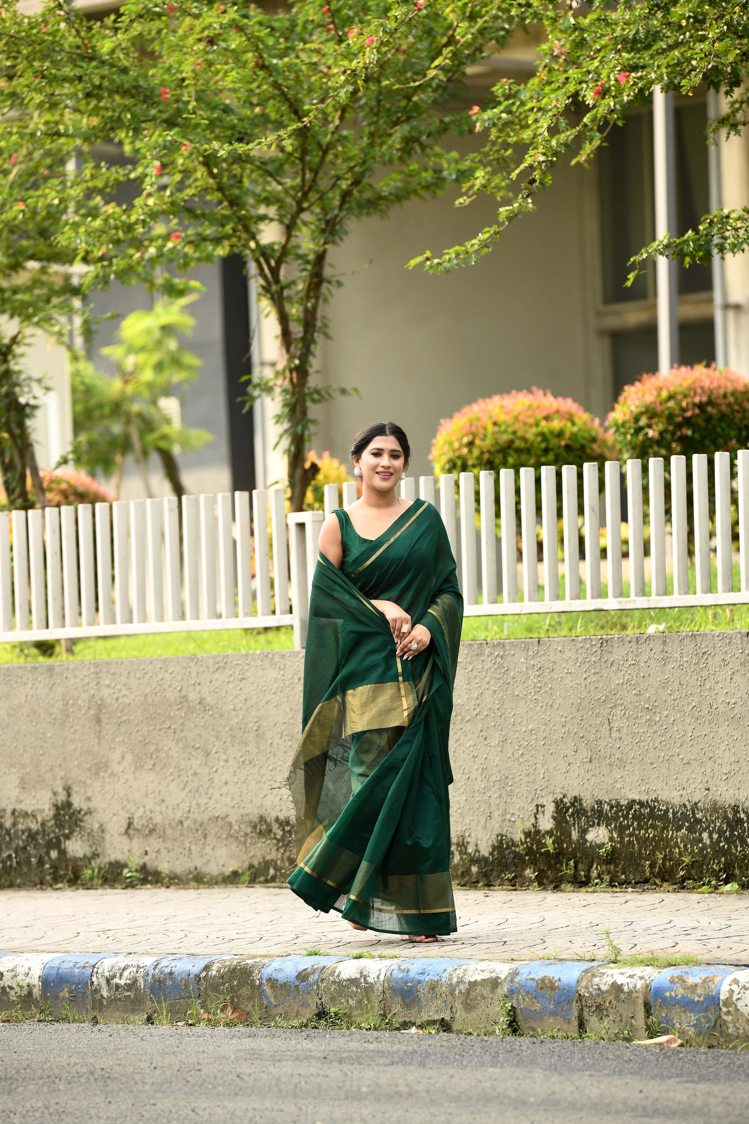 Bottle green cotton silk handwoven saree with self stripes and gold pallu