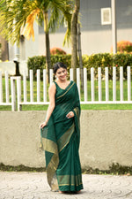 Bottle green cotton silk handwoven saree with self stripes and gold pallu
