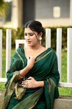 Bottle green cotton silk handwoven saree with self stripes and gold pallu