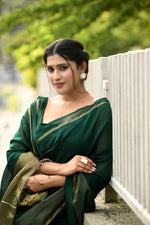 Bottle green cotton silk handwoven saree with self stripes and gold pallu