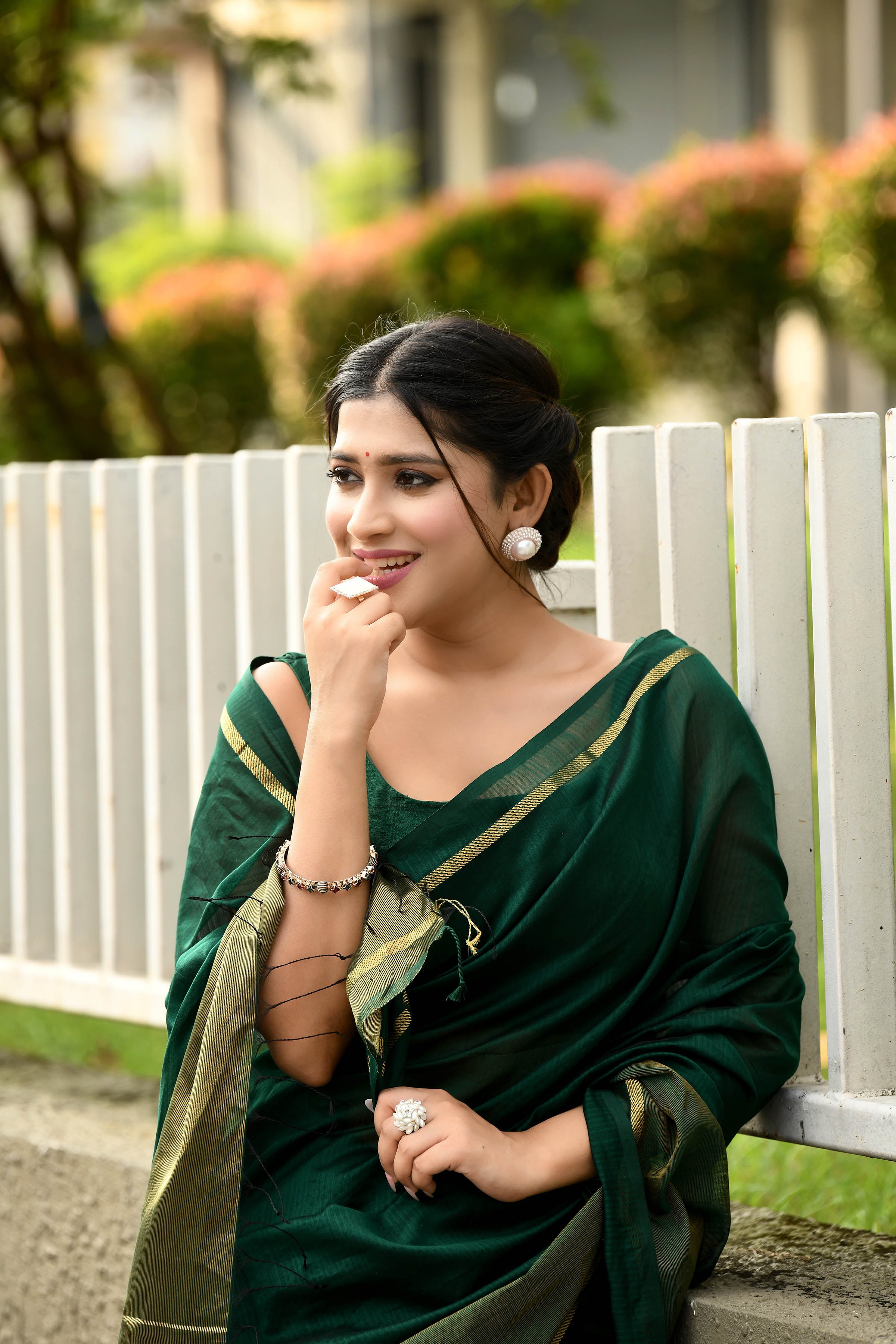 Bottle green cotton silk handwoven saree with self stripes and gold pallu
