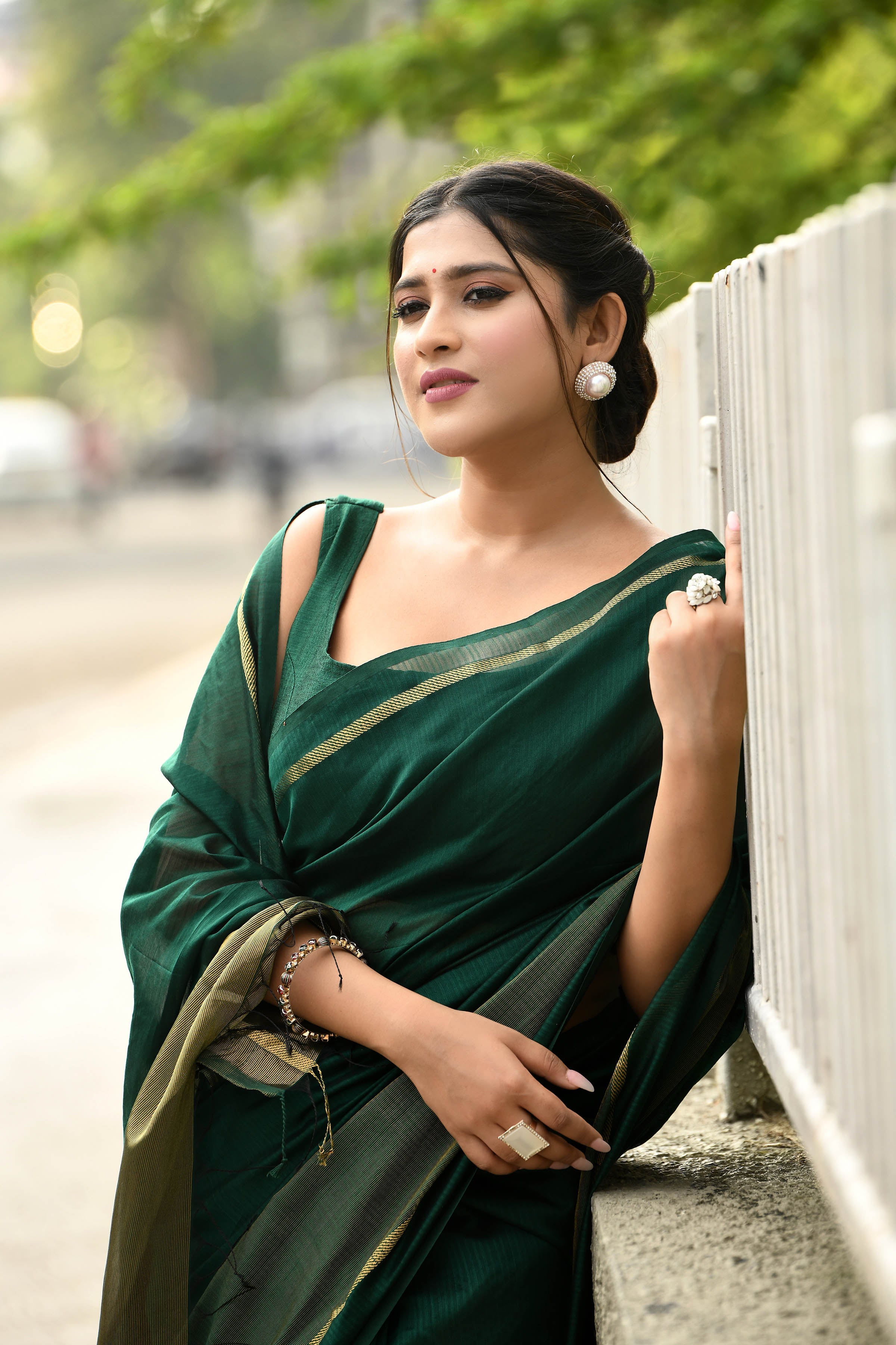 Bottle green cotton silk handwoven saree with self stripes and gold pallu