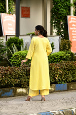 Radiant Yellow pintex cotton U shaped long straight kurta with matching trousers