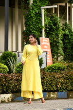 Radiant Yellow pintex cotton U shaped long straight kurta with matching trousers