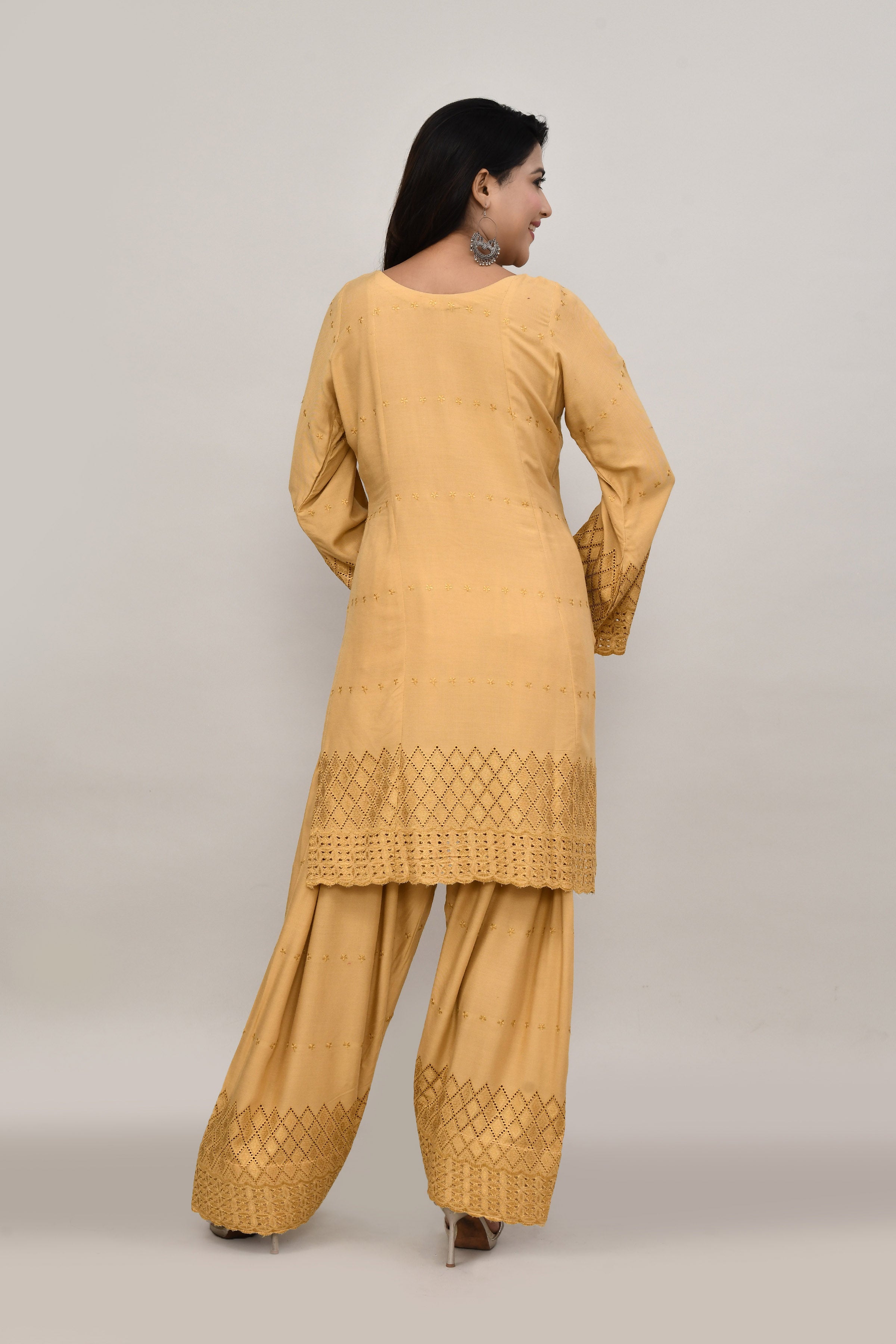 Elegant beige flared sleeves mid thigh length straight kurta and farshi salwar set with cut work embroidery