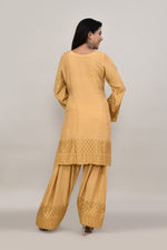 Elegant beige flared sleeves mid thigh length straight kurta and farshi salwar set with cut work embroidery