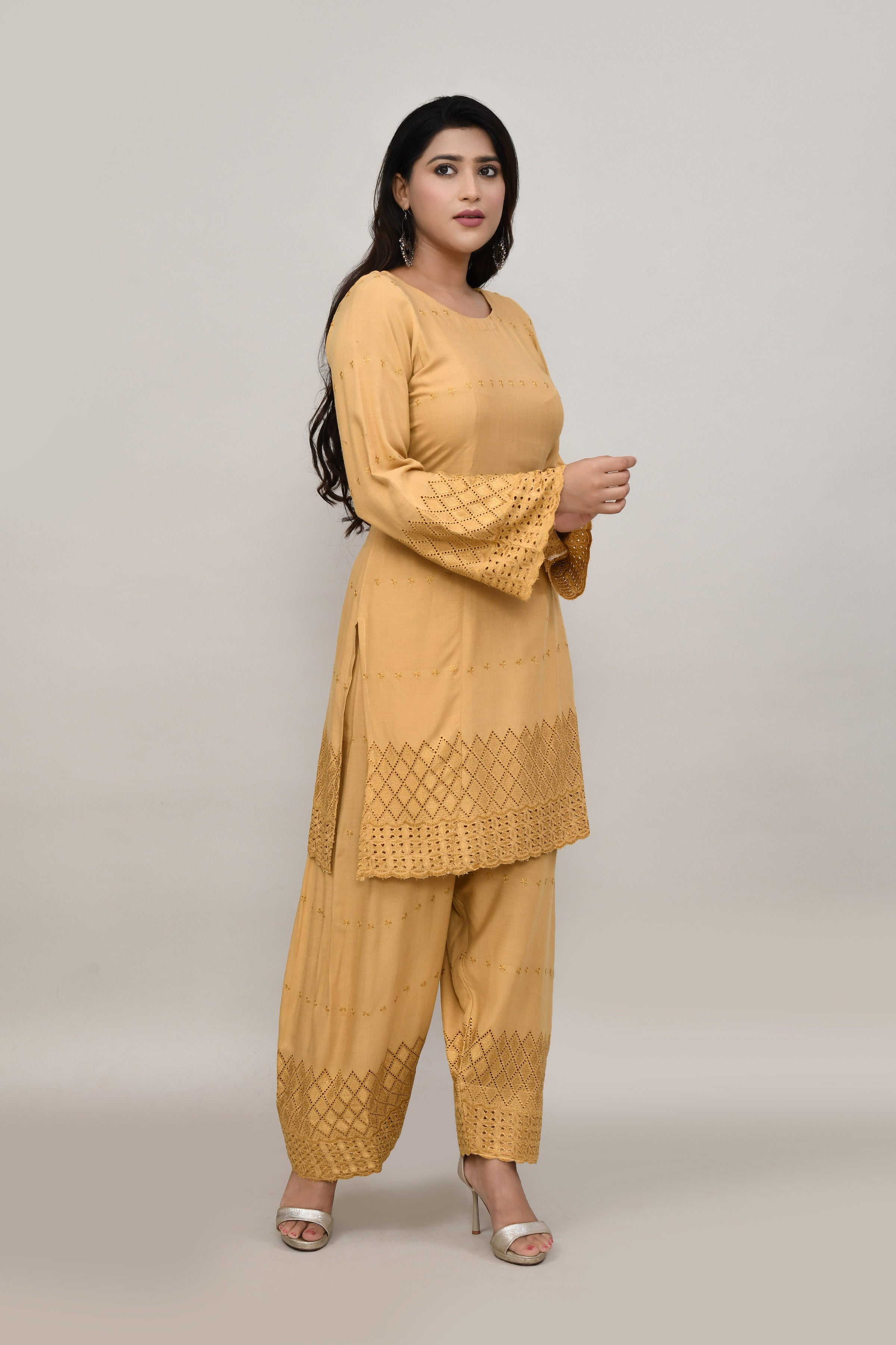 Elegant beige flared sleeves mid thigh length straight kurta and farshi salwar set with cut work embroidery
