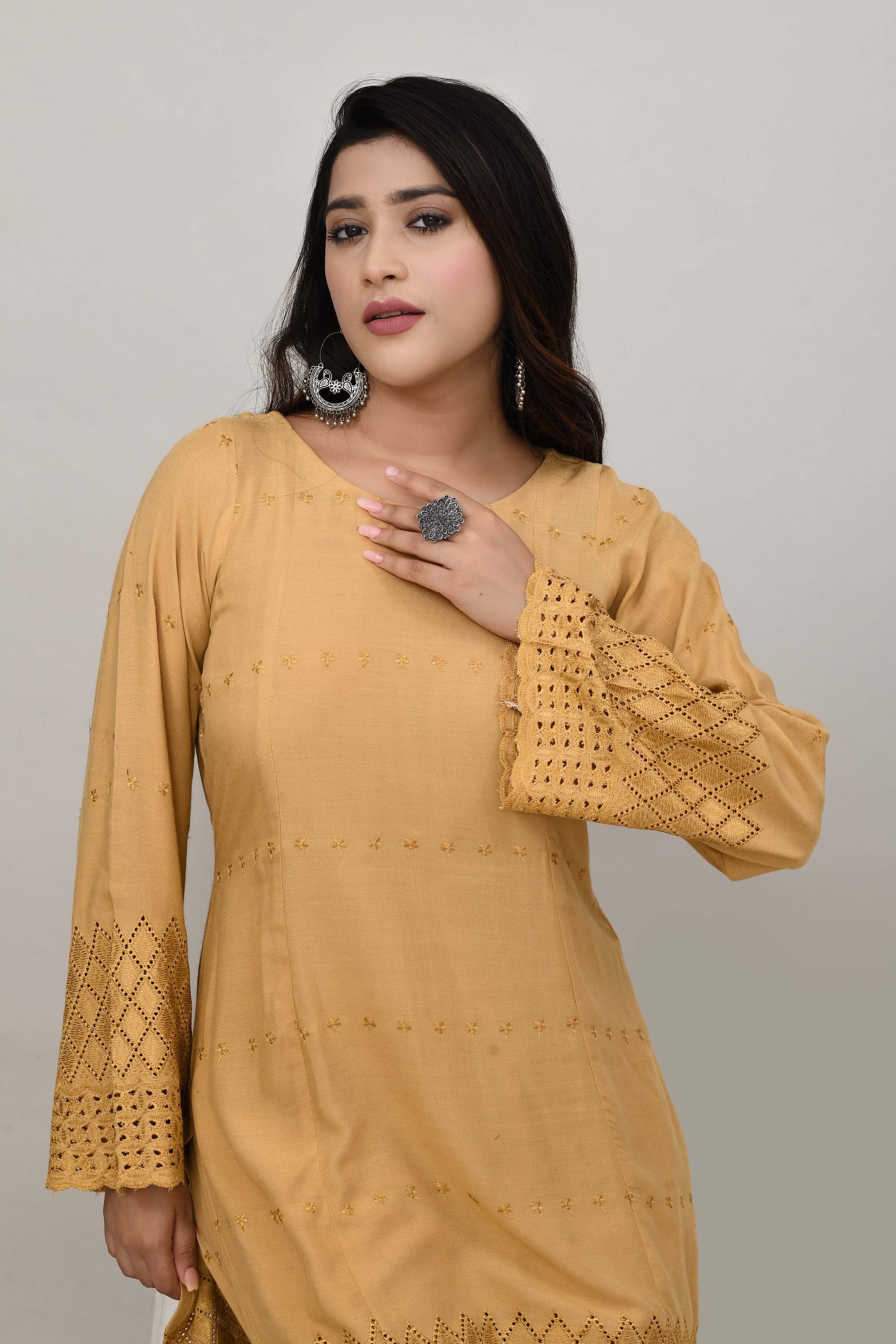 Elegant beige flared sleeves mid thigh length straight kurta and farshi salwar set with cut work embroidery