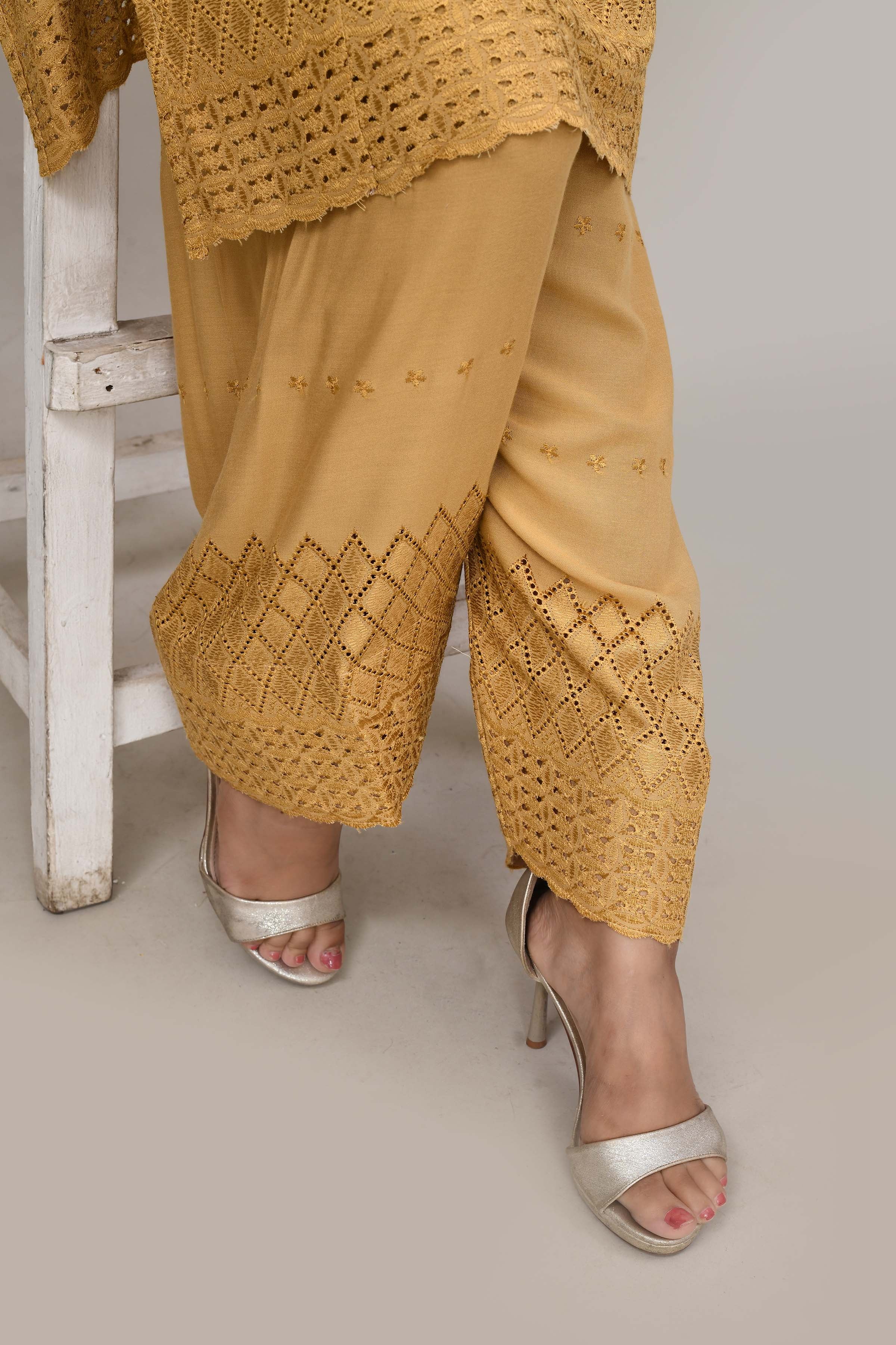 Elegant beige flared sleeves mid thigh length straight kurta and farshi salwar set with cut work embroidery