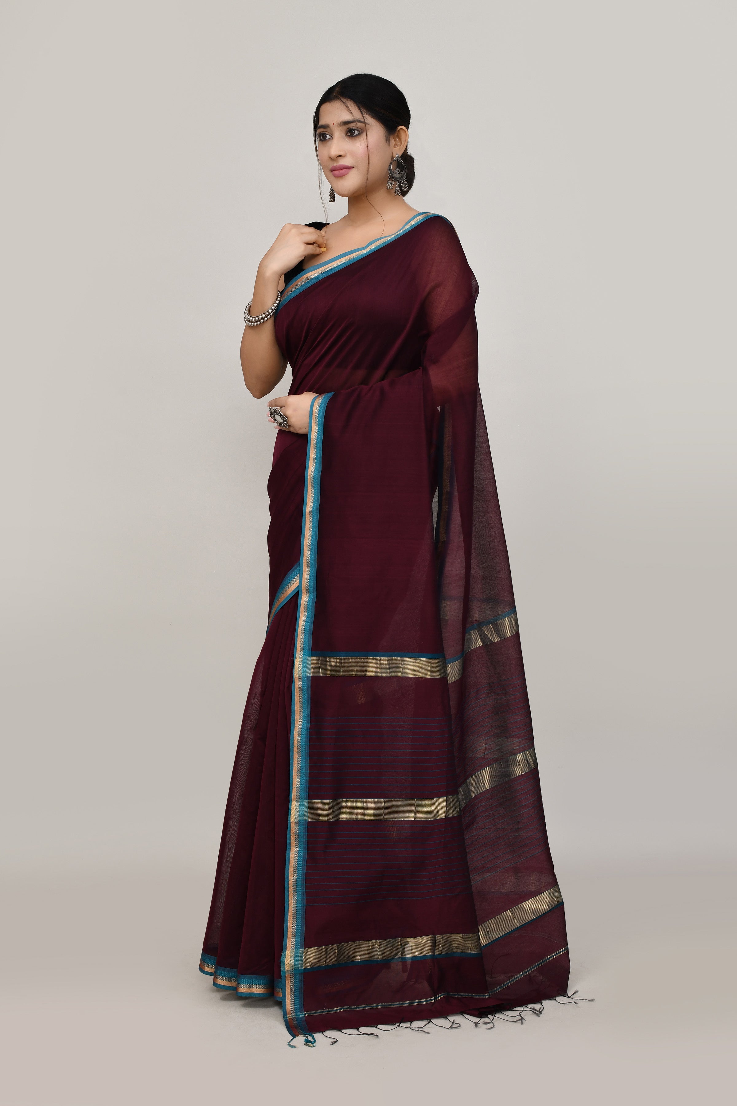 Coffee brown cotton silk hand woven saree with teal blue and golden border