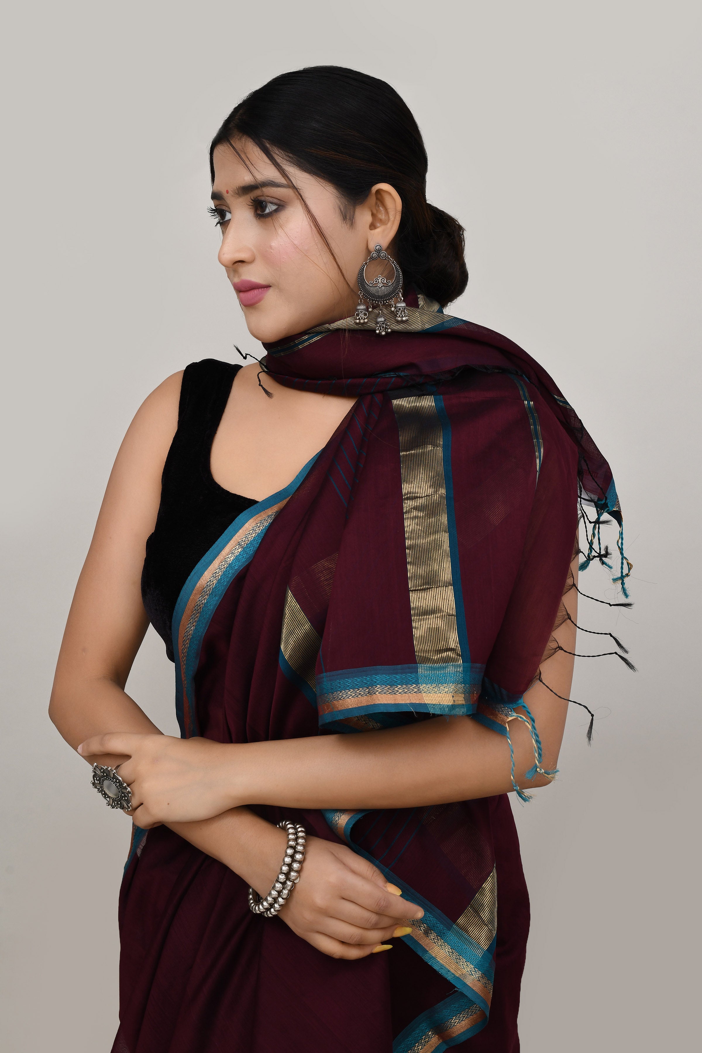 Coffee brown cotton silk hand woven saree with teal blue and golden border