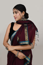 Coffee brown cotton silk hand woven saree with teal blue and golden border