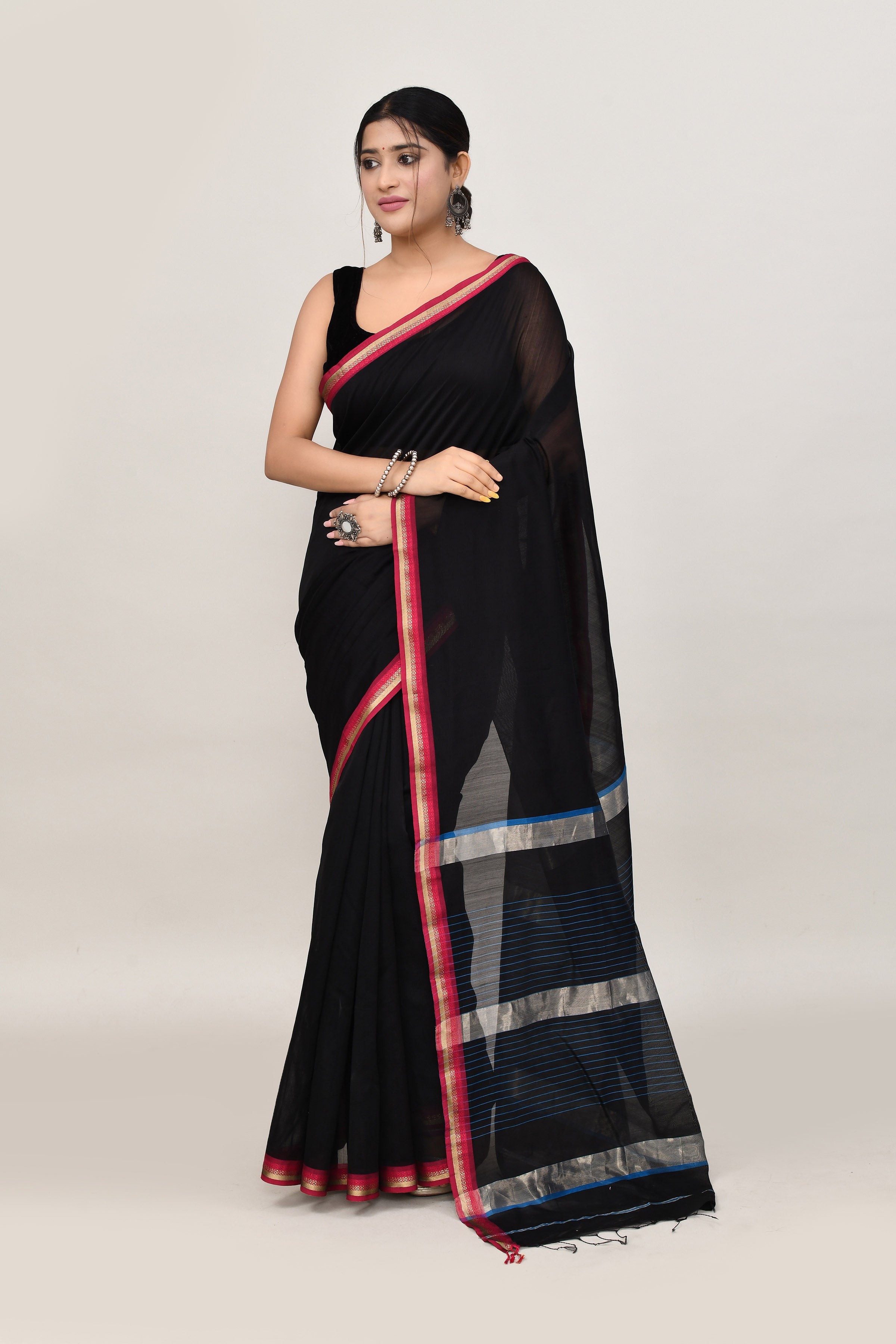 Black cotton silk hand woven saree with dark pink and golden border